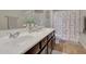 Clean bathroom with double sinks and shower/tub combo at 20744 W Hamilton St, Buckeye, AZ 85396