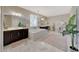 Luxurious bathroom with double vanity, soaking tub, and marble flooring at 20744 W Hamilton St, Buckeye, AZ 85396