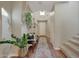 Bright entryway with a runner rug and bench at 20744 W Hamilton St, Buckeye, AZ 85396