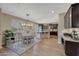 Well-equipped kitchen with dark cabinetry, breakfast nook and island at 20744 W Hamilton St, Buckeye, AZ 85396