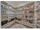 Well-organized pantry with ample shelving for storage at 20744 W Hamilton St, Buckeye, AZ 85396