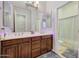 Elegant bathroom with double vanity and LED lighting at 20882 W Eastview Way, Buckeye, AZ 85396