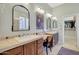 Large bathroom with double vanity and walk-in closet at 20882 W Eastview Way, Buckeye, AZ 85396