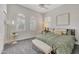 Bright bedroom with plantation shutters and comfy bed at 20882 W Eastview Way, Buckeye, AZ 85396