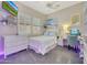 Serene bedroom with white bedding and built-in shelving at 20882 W Eastview Way, Buckeye, AZ 85396