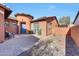 Charming courtyard entry with a brick patio and seating area at 20882 W Eastview Way, Buckeye, AZ 85396