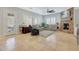 Relaxing living room with fireplace and plenty of natural light at 20882 W Eastview Way, Buckeye, AZ 85396