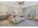 Spacious main bedroom with sitting area and fireplace at 20882 W Eastview Way, Buckeye, AZ 85396