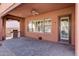 Covered patio with built-in grill and seating area at 20882 W Eastview Way, Buckeye, AZ 85396