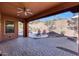 Spacious patio overlooking the pool and backyard at 20882 W Eastview Way, Buckeye, AZ 85396