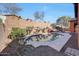 Inviting kidney-shaped pool with a large patio area at 20882 W Eastview Way, Buckeye, AZ 85396