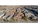 Aerial view showcasing the house's curb appeal and neighborhood setting at 21160 E Cattle Dr, Queen Creek, AZ 85142