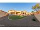 Spacious backyard with artificial turf at 213 E Summerside Rd, Phoenix, AZ 85042