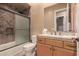 Bathroom with tiled shower, vanity, and toilet at 213 E Summerside Rd, Phoenix, AZ 85042