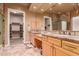 Bathroom with double vanity and walk-in closet at 213 E Summerside Rd, Phoenix, AZ 85042