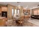 Casual dining area with adjacent kitchen and Gathering room at 213 E Summerside Rd, Phoenix, AZ 85042