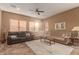 Bright living room with large windows and ample seating at 213 E Summerside Rd, Phoenix, AZ 85042