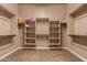 Spacious walk-in closet with ample shelving and hanging space at 213 E Summerside Rd, Phoenix, AZ 85042