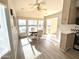 Sunny dining area with a round table and four chairs near kitchen at 2358 S Pomo Ave, Apache Junction, AZ 85119