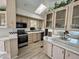 Well-lit kitchen with ample cabinetry and stainless steel appliances at 2358 S Pomo Ave, Apache Junction, AZ 85119