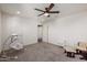 Bedroom with crib, rocker, and ceiling fan at 2413 E Alta Vista Rd, Phoenix, AZ 85042