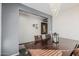 Elegant dining room with a wood table and chandelier at 2413 E Alta Vista Rd, Phoenix, AZ 85042