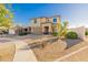 Two story home with attractive landscaping and two car garage at 2413 E Alta Vista Rd, Phoenix, AZ 85042