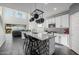 Modern kitchen with granite countertops and white cabinets at 2413 E Alta Vista Rd, Phoenix, AZ 85042