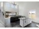 Spacious living room with high ceilings and a fireplace at 2413 E Alta Vista Rd, Phoenix, AZ 85042