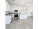 Beautiful kitchen with white cabinetry, stainless steel appliances, and an island at 25505 W Brookhart Way, Wittmann, AZ 85361