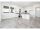 Bright eat-in kitchen with stainless steel appliances, granite countertops and tile floors at 25505 W Brookhart Way, Wittmann, AZ 85361