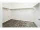 Walk-in closet with ample shelving and rod space, offering plenty of storage solutions at 25505 W Brookhart Way, Wittmann, AZ 85361