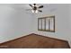 Bright bedroom with hardwood floors and window shutters at 2731 E Laurel Ln, Phoenix, AZ 85028