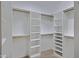 Large walk-in closet with ample shelving and hanging space at 2731 E Laurel Ln, Phoenix, AZ 85028