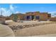 Tan stucco house with a rock and gravel front yard at 2731 E Laurel Ln, Phoenix, AZ 85028