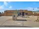 Single-story home with desert landscaping and a two-car garage at 2731 E Laurel Ln, Phoenix, AZ 85028