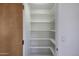 Spacious pantry with ample shelving for storage at 2731 E Laurel Ln, Phoenix, AZ 85028