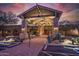 Striking clubhouse entrance with stone pillars and manicured desert landscaping at 2742 N Augustine --, Mesa, AZ 85207