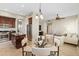 Open concept: Beautiful kitchen with island flows into dining area and living room at 2742 N Augustine --, Mesa, AZ 85207