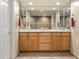 Double vanity bathroom with granite countertops at 28990 N White Feather Ln # 130, Scottsdale, AZ 85262