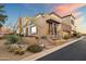 Beautiful two-story home with stone accents and landscaped entryway at 28990 N White Feather Ln # 130, Scottsdale, AZ 85262