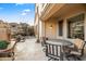 Relaxing patio with seating area and a tranquil water feature at 28990 N White Feather Ln # 130, Scottsdale, AZ 85262