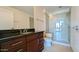 Beautiful bathroom with double vanity sinks and a glass-enclosed shower at 310 S 4Th St # 2202, Phoenix, AZ 85004