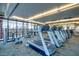 Well-equipped gym with modern treadmills, weights, and floor-to-ceiling windows at 310 S 4Th St # 2202, Phoenix, AZ 85004