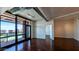 Open living area with hardwood floors, large windows offering city views and contemporary finishes at 310 S 4Th St # 2202, Phoenix, AZ 85004