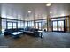 Expansive lounge space featuring a large sectional sofa, city views, and contemporary design at 310 S 4Th St # 2202, Phoenix, AZ 85004