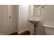 Contemporary powder room with pedestal sink and modern fixtures at 310 S 4Th St # 2202, Phoenix, AZ 85004