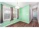 Simple dining area with light walls and hardwood floors at 3104 E Broadway Rd # 9, Mesa, AZ 85204