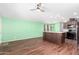 Open concept kitchen with island and dark wood cabinets at 3104 E Broadway Rd # 9, Mesa, AZ 85204