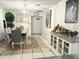 Bright dining room featuring a formal dining set and decorative accents at 3125 W Mclellan Blvd, Phoenix, AZ 85017